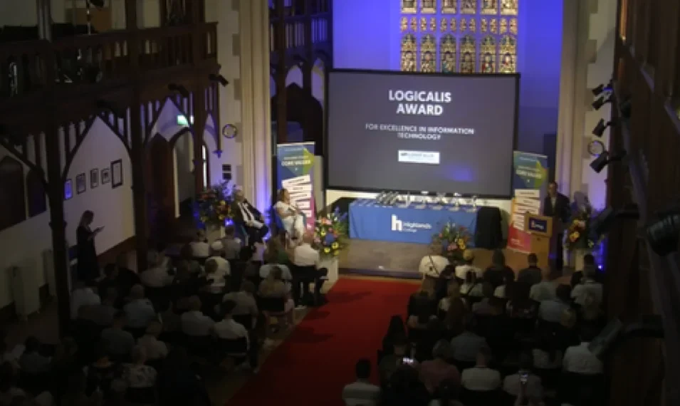 A large hall at Highlands College, with a gathering of students and facaulty members to present various awards